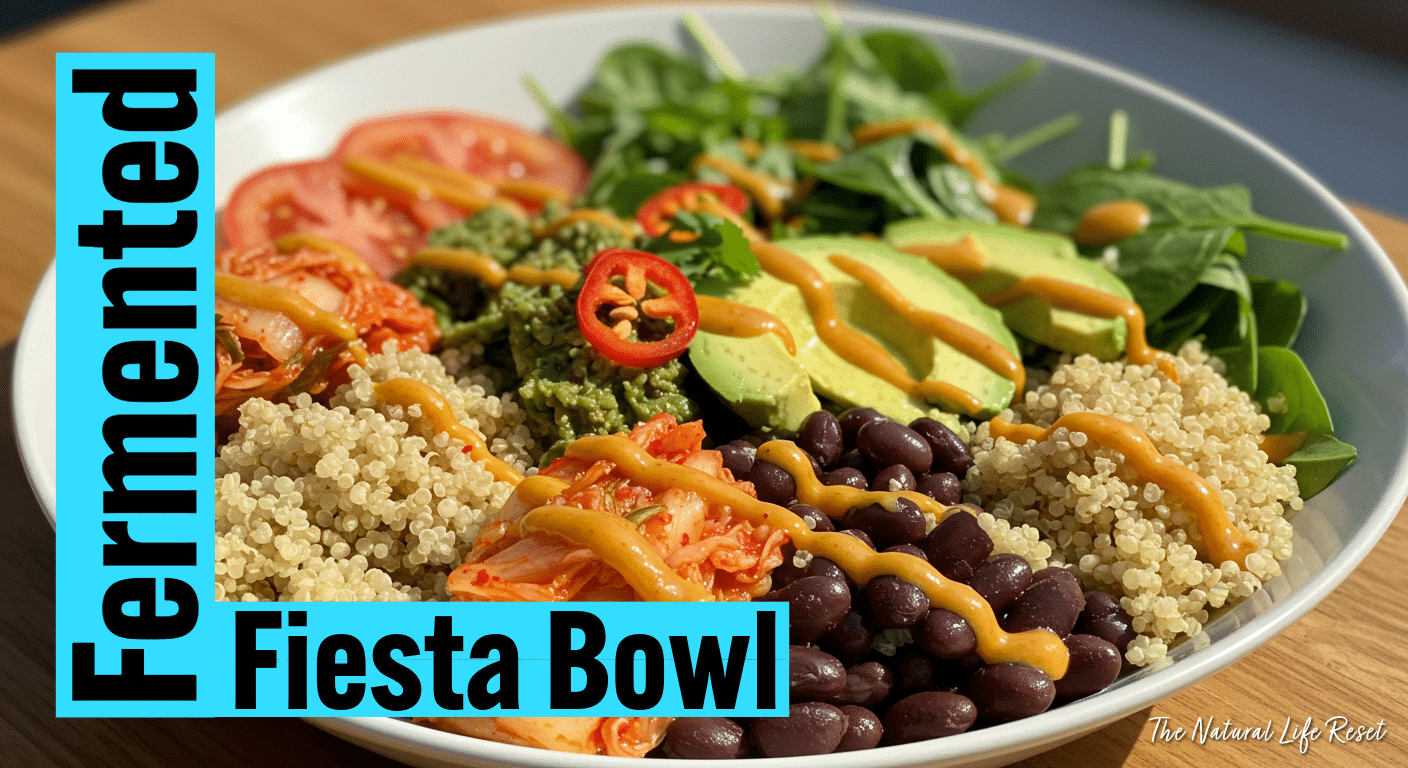 Close-up of a colorful bowl with quinoa, beans, greens, kimchi, and avocado slices